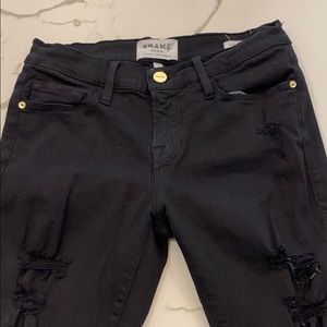 Black frame skinny ripped jeans